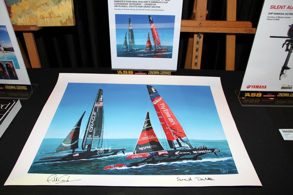 Several signed prints of Oracle Team USA and Emirates Team NZ’s AC’s was bid in a stand up auction © Richard Gladwell www.photosport.co.nz
